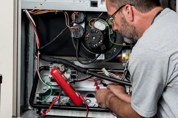 technician working on furnace